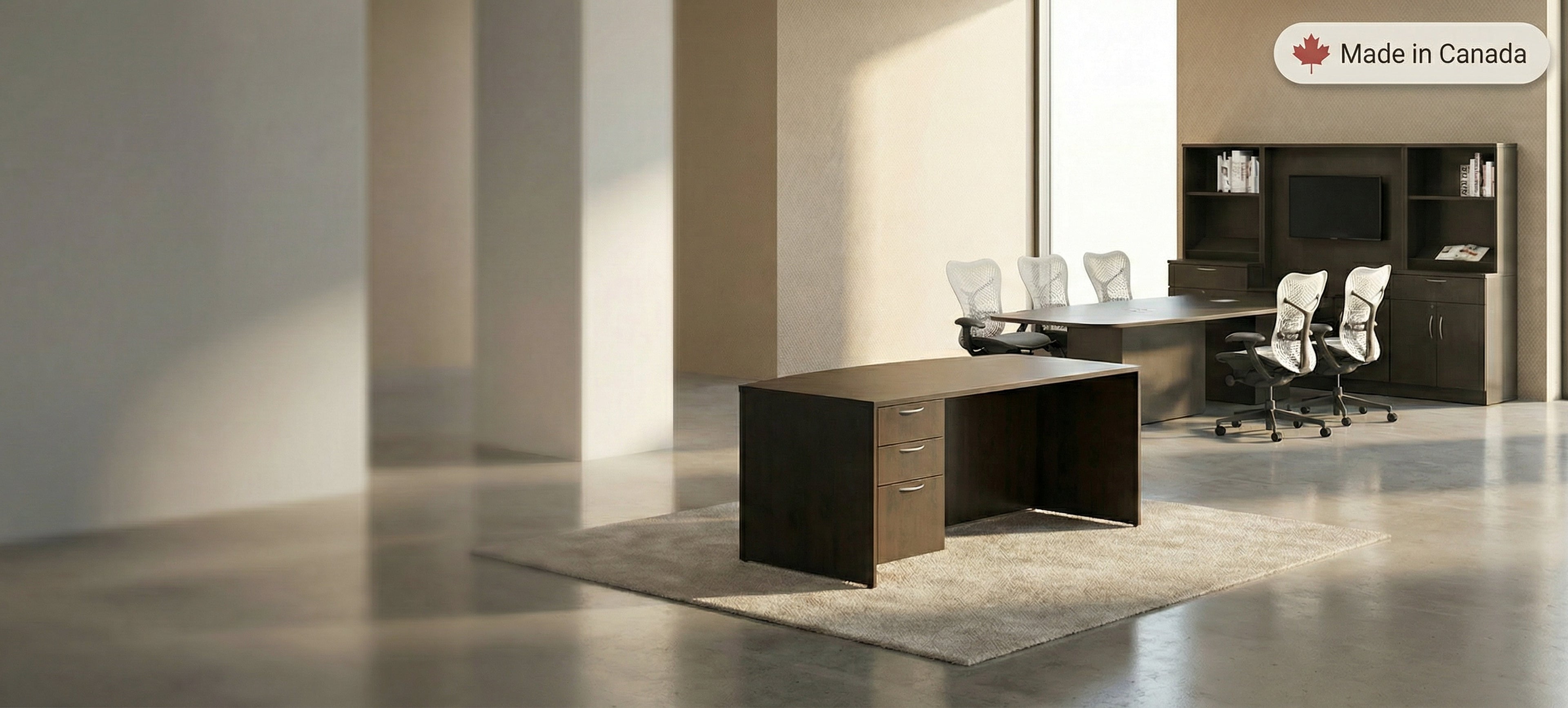 Modern office desk with chairs in a professional setting, featuring 'Made in Canada' label.